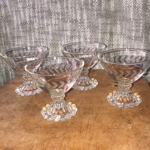 4 boopie footed dessert goblets. Circa 1950